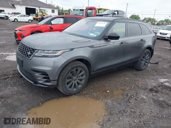 2019 Land Rover Range Rover Velar R-Dynamic SE z VIN SALYL2EX1KA227926, wystawiony jako IAAI lot #42353130 z przebiegiem 39 890 mil mil oraz . Historia ofert i sprzedaży dostępna na DreamBid. Obrazek 2.