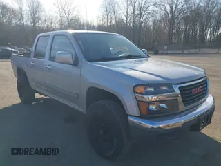 2012 GMC Canyon SLE1 with VIN 1GTH6MFE2C8106354, listed as a IAAI auction lot 41910921 with 127,812 mi miles. Bid and sale history available at carsss.com. Image 1.