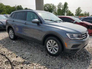 2018 Volkswagen Tiguan S with VIN 3VV0B7AXXJM131760, listed as a Copart auction lot 58831685 with 124,431 mi miles and Salvage title. Bid and sale history available at DreamBid. Image 4.