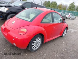2005 Volkswagen New Beetle Coupe GLS with VIN 3VWCK31C95M405955, listed as a IAAI auction lot 41679148 with 96,413 mi miles. Bid and sale history available at carsss.com. Image 4.