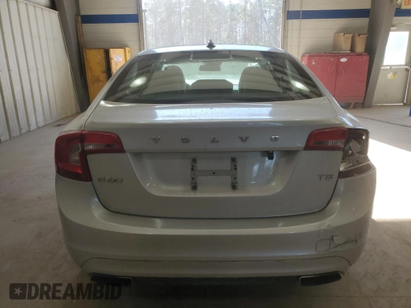 2014 Volvo S60 T5 with VIN YV1612FS7E2293736, listed as a Copart auction lot 42958965 with 127,657 mi miles and Salvage Title. Bid and sale history available at carsss.com. Image 6.