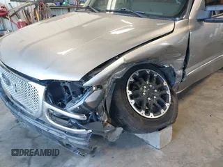 2000 GMC New Sierra 1500 SLE with VIN 1GTEK14T6YZ342215, listed as a IAAI auction lot 42023647 with 142,649 mi miles. Bid and sale history available at carsss.com. Image 6.