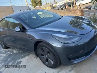2023 Tesla Model 3 z VIN 5YJ3E1EA1PF607137, wystawiony jako Copart lot #62613375 z przebiegiem 27 271 mil mil oraz Czysty tytuł • Clean title. Historia ofert i sprzedaży dostępna na DreamBid. Obrazek 1.