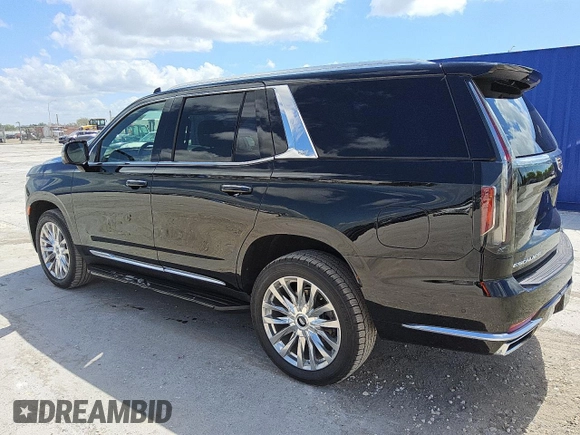 2023 Cadillac Escalade 4WD Premium Luxury with VIN 1GYS4BKL7PR332923, listed as a Copart auction lot 57442025 with 56,886 mi miles and Clean title. Bid and sale history available at DreamBid. Image 2.