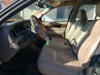 2003 Mercury Grand Marquis LS Premium with VIN 2MEFM75W93X684541, listed as a Copart auction lot 52642415 with 144,114 mi miles and Salvage Title. Bid and sale history available at carsss.com. Image 7.