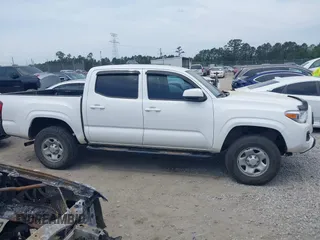 2022 Toyota Tacoma SR with VIN 3TYCZ5AN9NT098903, listed as a IAAI auction lot 42088505 with 93,000 mi miles and . Bid and sale history available at DreamBid. Image 13.