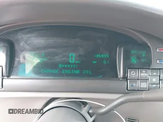 1999 Cadillac DeVille DHS z VIN 1G6KE54Y2XU752599, wystawiony jako IAAI lot #42141950 z przebiegiem 135 999 mil mil oraz . Historia ofert i sprzedaży dostępna na DreamBid. Obrazek 7.