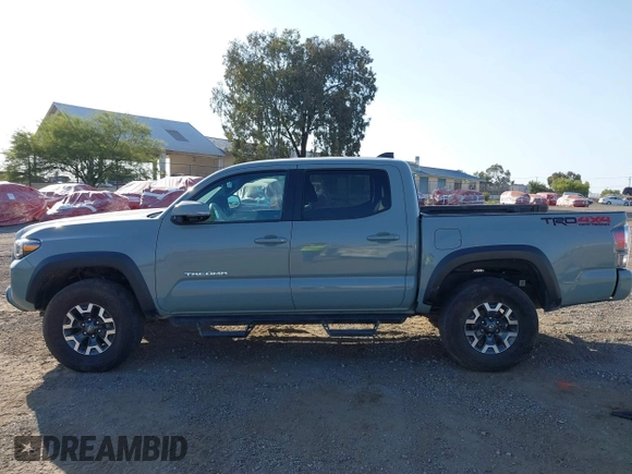 2022 Toyota Tacoma SR with VIN 3TMCZ5AN7NM501028, listed as a IAAI auction lot 42537868 with 42,186 mi miles and . Bid and sale history available at DreamBid. Image 14.