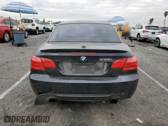 2011 BMW 3 Series 335i with VIN WBADX7C59BE743322, listed as a Copart auction lot 84219074 with 94,623 mi miles and Salvage Title. Bid and sale history available at carsss.com. Image 6.