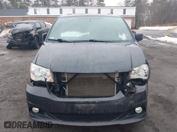 2014 Dodge Grand Caravan SXT with VIN 2C4RDGCG2ER463395, listed as a IAAI auction lot 41709948 with 137,783 mi miles and . Bid and sale history available at DreamBid. Image 6.