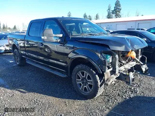 2015 Ford F-150 XLT w/HD Payload Pkg with VIN 1FTFW1EG5FFC13942, listed as a IAAI auction lot 41392709 with 196,416 mi miles. Bid and sale history available at carsss.com. Image 1.