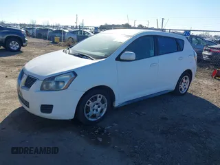 2010 Pontiac Vibe w/1SB with VIN 5Y2SP6E05AZ412346, listed as a IAAI auction lot 41422183 with 135,601 mi miles. Bid and sale history available at carsss.com. Image 2.