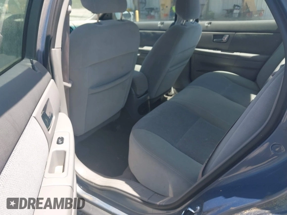 2000 Ford Taurus SE with VIN 1FAFP53U1YG213906, listed as a IAAI auction lot 42064922 with 117,043 mi miles and . Bid and sale history available at DreamBid. Image 8.