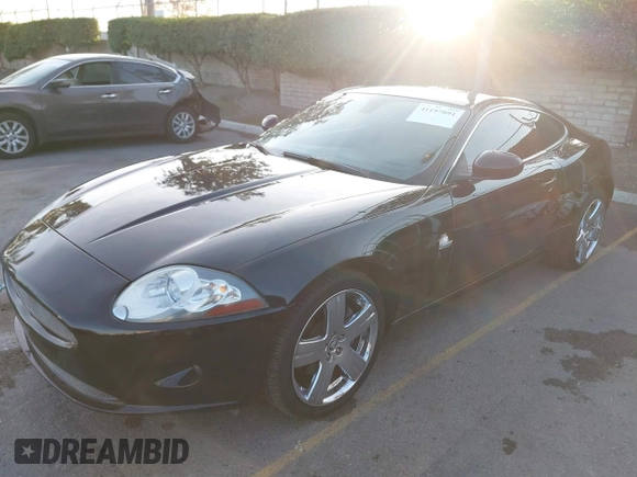 2008 Jaguar XK with VIN SAJWA43B985B23987, listed as a IAAI auction lot 41197091 with 54,803 mi miles. Bid and sale history available at carsss.com. Image 17.