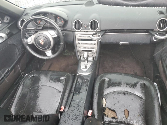 2005 Porsche Boxster z VIN WP0CA298X5U712515, wystawiony jako Copart lot #74030354 z przebiegiem Nie podano mil oraz Szkoda całkowita • Salvage title. Historia ofert i sprzedaży dostępna na DreamBid. Obrazek 8.