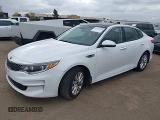2016 Kia Optima EX with VIN 5XXGU4L31GG086203, listed as a IAAI auction lot 42128099 with 157,988 mi miles. Bid and sale history available at carsss.com. Image 2.
