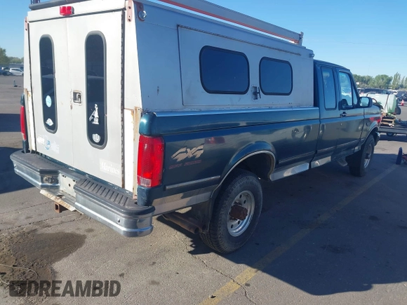 1995 Ford F-250 HD with VIN 1FTHX26G9SKB88703, listed as a IAAI auction lot 42119055 with 313,363 mi miles. Bid and sale history available at carsss.com. Image 4.
