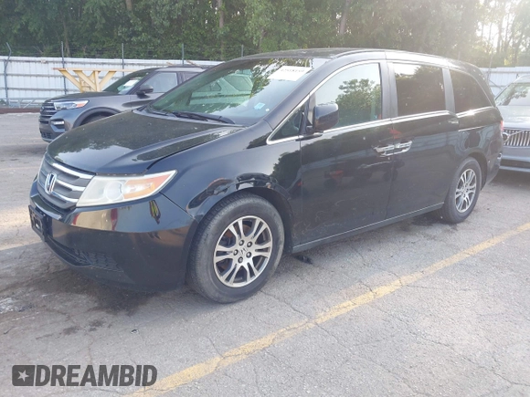2012 Honda Odyssey EX-L with VIN 5FNRL5H60CB075811, listed as a IAAI auction lot 42518159 with 243,186 mi miles and . Bid and sale history available at DreamBid. Image 17.