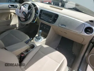 2015 Volkswagen Beetle 1.8T с VIN 3VW517AT5FM804169, выставлен на аукционе Copart как лот 65981544 с пробегом 104 754 миль миль и Списание • Salvage title. История ставок и продаж доступна на DreamBid. Изображение 8.