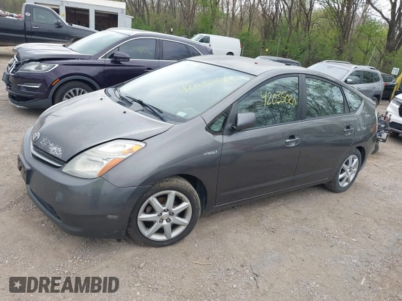 2008 Toyota Prius with VIN JTDKB20U583306977, listed as a IAAI auction lot 42035020 with 212,788 mi miles. Bid and sale history available at carsss.com. Image 2.