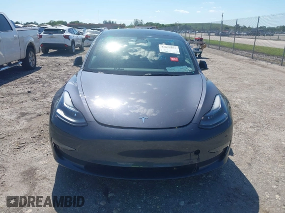2023 Tesla Model 3 with VIN 5YJ3E1EA8PF626235, listed as a IAAI auction lot 42022893 with 30,333 mi miles and . Bid and sale history available at DreamBid. Image 6.