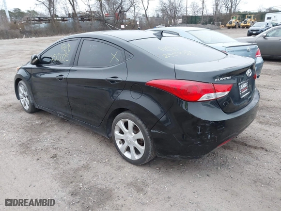 2012 Hyundai Elantra GLS with VIN KMHDH4AE4CU217877, listed as a IAAI auction lot 41927929 with 999,999 mi miles. Bid and sale history available at carsss.com. Image 3.