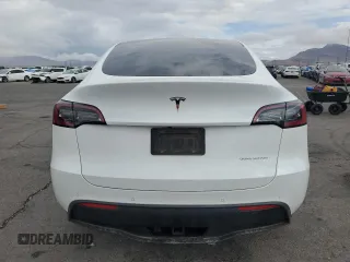 2021 Tesla Model Y Long Range z VIN 5YJYGDEE9MF200411, wystawiony jako Copart lot #53738075 z przebiegiem 97 546 mil mil oraz Szkoda całkowita • Salvage title. Historia ofert i sprzedaży dostępna na DreamBid. Obrazek 6.