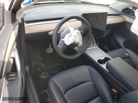 2022 Tesla Model Y Long Range with VIN 7SAYGAEE9NF517298, listed as a Copart auction lot 49450055 with 0 mi miles and Salvage Title. Bid and sale history available at carsss.com. Image 8.