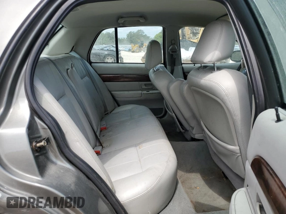 2004 Mercury Grand Marquis LS Premium z VIN 2MEFM75W34X688862, wystawiony jako Copart lot #56801635 z przebiegiem 150 371 mil mil oraz Szkody całkowita. Historia ofert i sprzedaży dostępna na DreamBid. Obrazek 11.