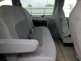 2012 Ford Econoline Passenger XL with VIN 1FBSS3BL3CDA97191, listed as a Copart auction lot 55284565 with 282,195 mi miles and Salvage title. Bid and sale history available at DreamBid. Image 11.