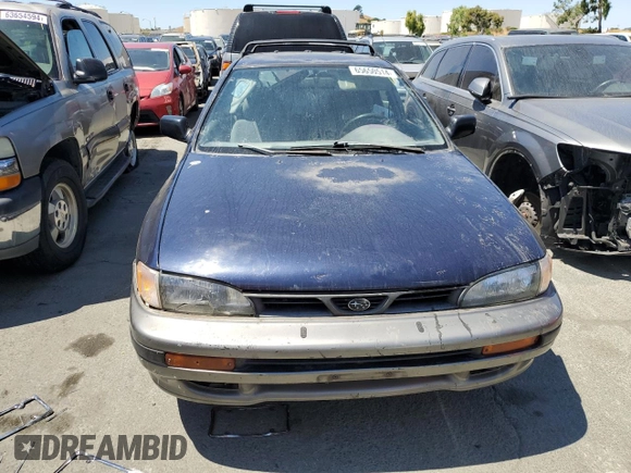 1996 Subaru Impreza Outback with VIN JF1GF4851TG811571, listed as a Copart auction lot 65650514 with 248,315 mi miles and Salvage title. Bid and sale history available at DreamBid. Image 5.