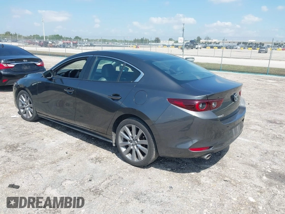 2023 Mazda 3 S Preferred with VIN 3MZBPACM8PM361196, listed as a IAAI auction lot 41940018 with 49,759 mi miles and . Bid and sale history available at DreamBid. Image 3.