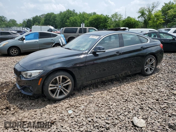 2017 BMW 4 Series 430i xDrive with VIN WBA4F9C56HG792005, listed as a Copart auction lot 59669735 with Not provided miles and Salvage title. Bid and sale history available at DreamBid. Image 1.
