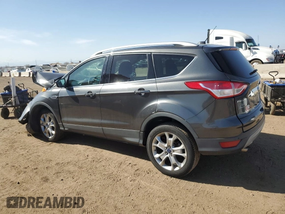 2016 Ford Escape Titanium with VIN 1FMCU9J96GUC63384, listed as a Copart auction lot 52255725 with 136,869 mi miles and Salvage Title. Bid and sale history available at carsss.com. Image 2.