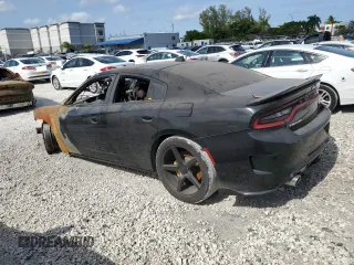 2019 Dodge Charger SRT Hellcat z VIN 2C3CDXL99KH671724, wystawiony jako Copart lot #56719475 z przebiegiem Nie podano mil oraz Szkoda całkowita • Salvage title. Historia ofert i sprzedaży dostępna na DreamBid. Obrazek 2.