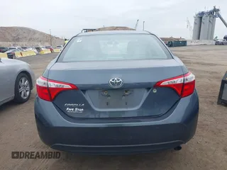 2014 Toyota Corolla L with VIN 2T1BURHE5EC027497, listed as a IAAI auction lot 42602880 with 101,094 mi miles and . Bid and sale history available at DreamBid. Image 16.