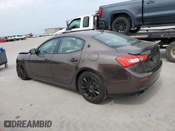 2014 Maserati Ghibli S Q4 with VIN ZAM57RTA6E1085708, listed as a Copart auction lot 53710095 with 110,799 mi miles and Salvage title. Bid and sale history available at DreamBid. Image 2.