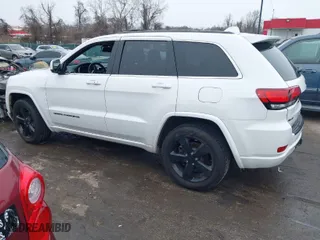 2015 Jeep Grand Cherokee Altitude with VIN 1C4RJFAG7FC954853, listed as a IAAI auction lot 40988796 with 107,002 mi miles. Bid and sale history available at carsss.com. Image 14.