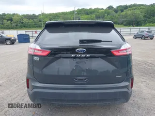 2021 Ford Edge SE with VIN 2FMPK4G97MBA50768, listed as a IAAI auction lot 42748557 with 89,523 mi miles and . Bid and sale history available at DreamBid. Image 16.