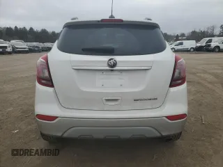 2019 Buick Encore Essence with VIN KL4CJCSM7KB860734, listed as a Copart auction lot 47635295 with 23,935 mi miles and Salvage Title. Bid and sale history available at carsss.com. Image 6.