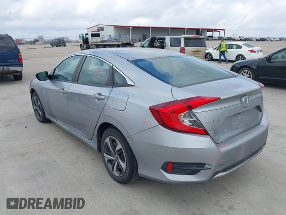 2020 Honda Civic LX z VIN 19XFC2F68LE001482, wystawiony jako IAAI lot #41484428 z przebiegiem 97 604 mil mil oraz . Historia ofert i sprzedaży dostępna na DreamBid. Obrazek 3.