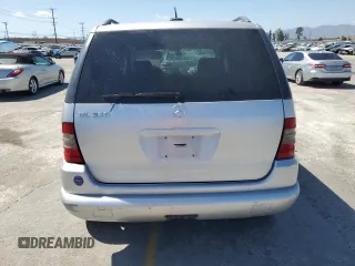 2001 Mercedes-Benz M 320/430/500 z VIN 4JGAB54E71A270139, wystawiony jako Copart lot #57175625 z przebiegiem 154 870 mil mil oraz Szkoda całkowita • Salvage title. Historia ofert i sprzedaży dostępna na DreamBid. Obrazek 6.