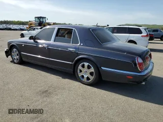 2005 Bentley Arnage R z VIN SCBLC37F15CX10517, wystawiony jako Copart lot #54303364 z przebiegiem 116 865 mil mil oraz Szkody całkowita. Historia ofert i sprzedaży dostępna na DreamBid. Obrazek 2.