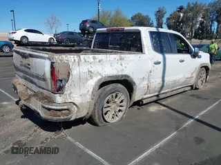 2022 GMC Sierra 1500 with VIN 3GTUUGETXNG640009, listed as a IAAI auction lot 41626847 with 43,537 mi miles and . Bid and sale history available at DreamBid. Image 4.