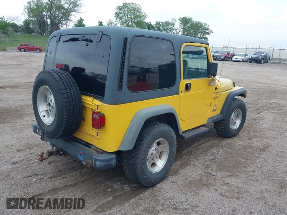 2000 Jeep Wrangler Sport with VIN 1J4FA49S3YP781614, listed as a IAAI auction lot 42292668 with 152,600 mi miles and . Bid and sale history available at DreamBid. Image 4.