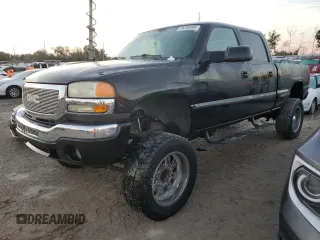 2005 GMC Sierra 2500HD Work Truck with VIN 1GTHC23UX5F857287, listed as a Copart auction lot 74255484 with 114,672 mi miles and Non repairable. Bid and sale history available at DreamBid. Image 1.