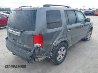 2011 Honda Pilot EX-L with VIN 5FNYF4H59BB042308, listed as a IAAI auction lot 41635511 with 196,736 mi miles and . Bid and sale history available at carsss.com. Image 4.
