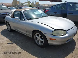 1999 Mazda MX-5 Miata z VIN JM1NB3539X0131393, wystawiony jako IAAI lot #42439850 z przebiegiem 210 710 mil mil oraz . Historia ofert i sprzedaży dostępna na DreamBid. Obrazek 1.