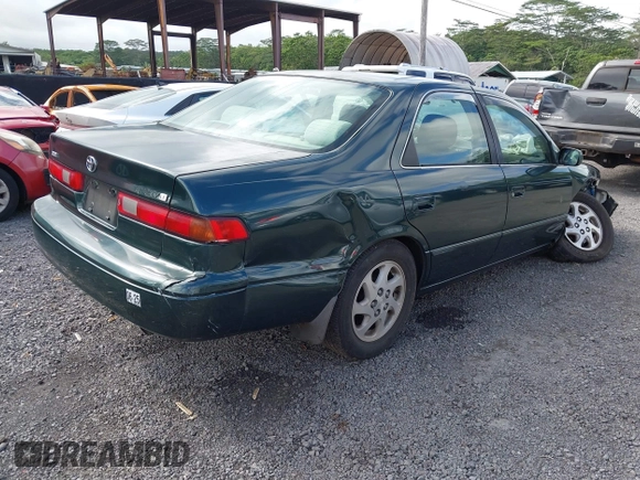 1999 Toyota Camry LE z VIN JT2BF22K2X0164080, wystawiony jako IAAI lot #40984874 z przebiegiem Nie podano mil oraz . Historia ofert i sprzedaży dostępna na DreamBid. Obrazek 4.