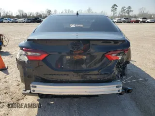 2023 Toyota Camry SE with VIN 4T1G11AK3PU077493, listed as a Copart auction lot 47218195 with 53,692 mi miles and Salvage Title. Bid and sale history available at DreamBid. Image 6.